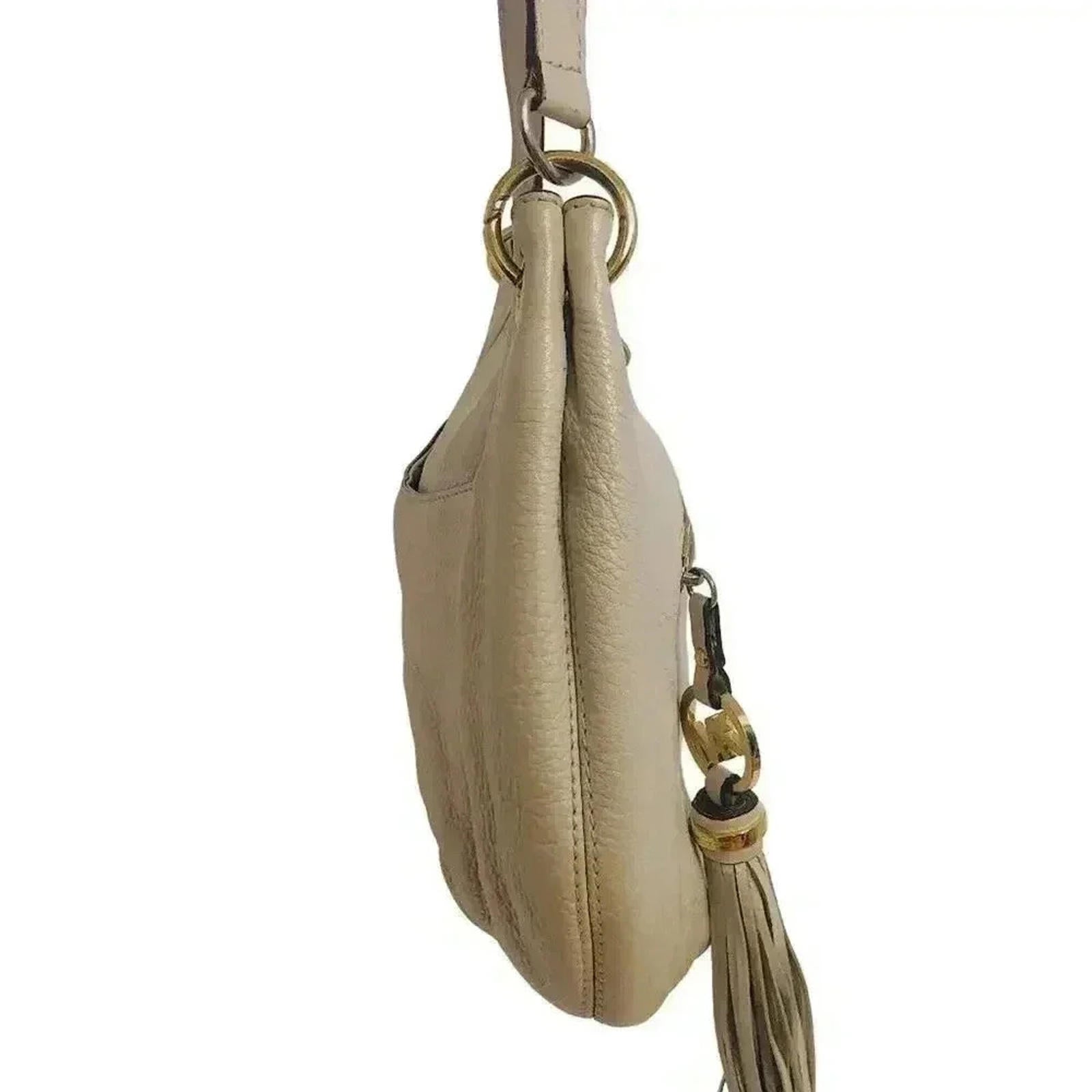 Michael Kors Crescent Shaped Cream Handbag