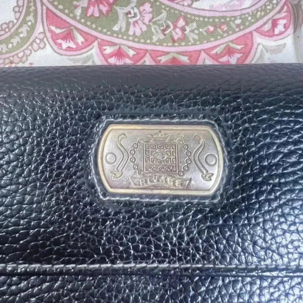 Rivage Black Pebbled Leather Trifold Wallet