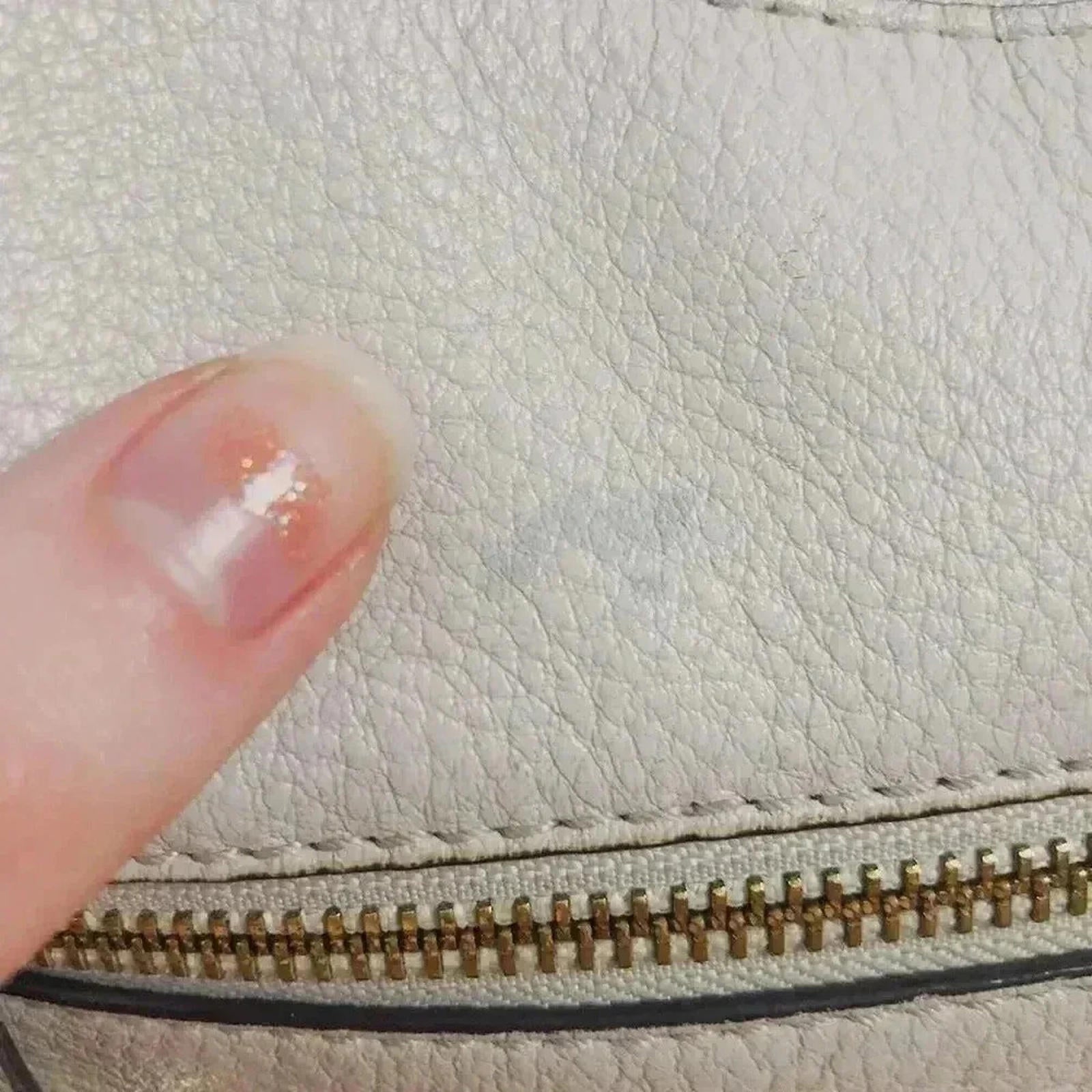 Michael Kors Crescent Shaped Cream Handbag