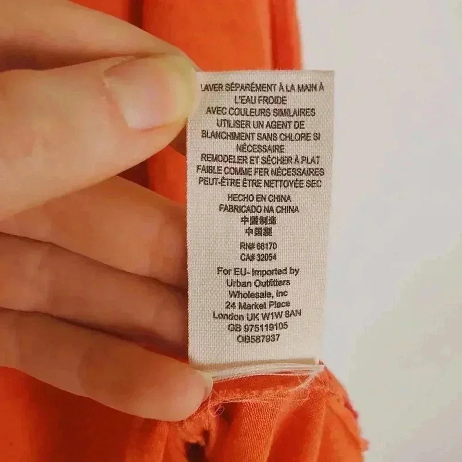 NWT Free People Orange Asymmetrical Burnout T Shirt Top Women's Size S